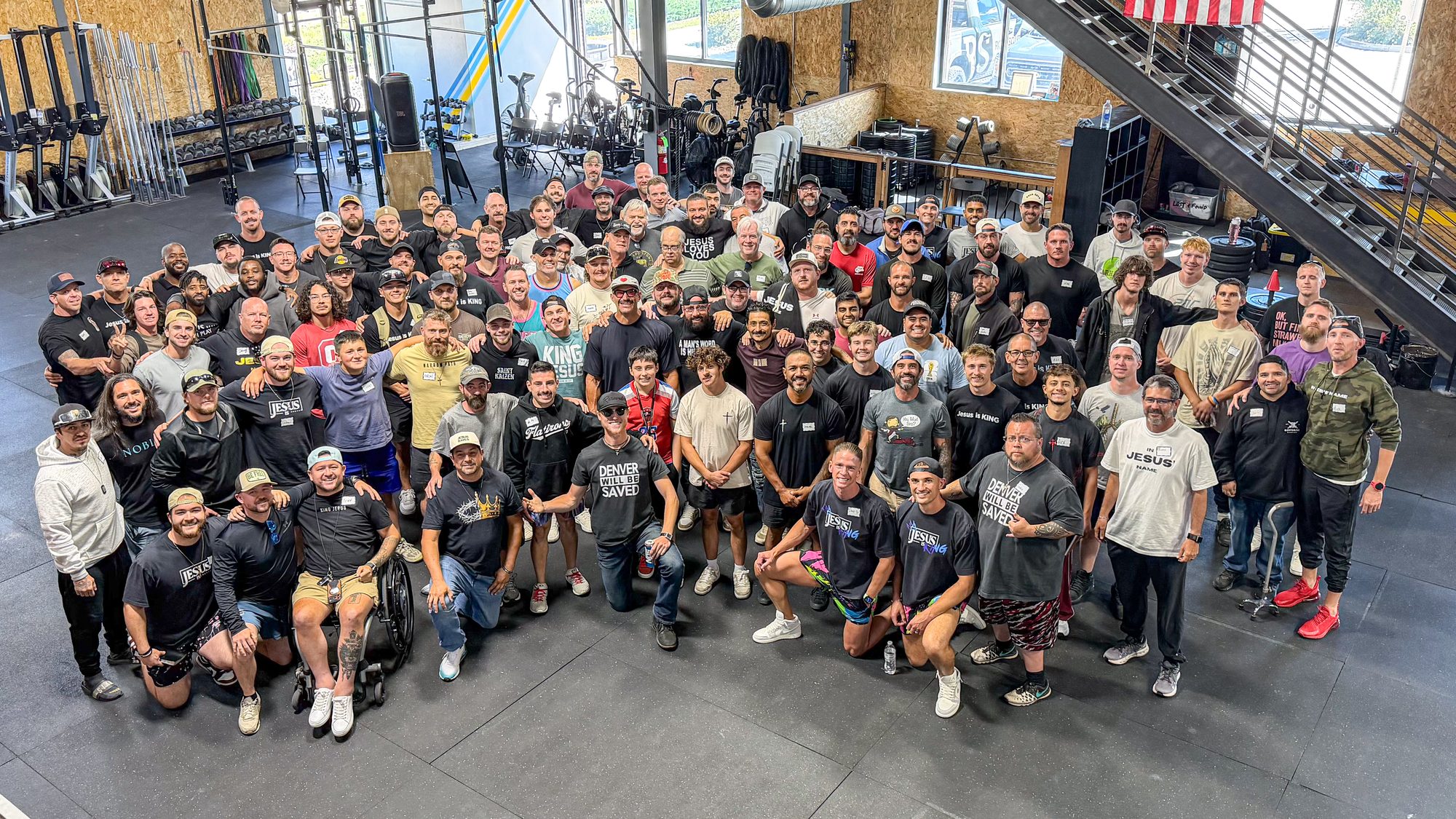 The men of Launching Pad gathered in a gym after the September 2026 weekend